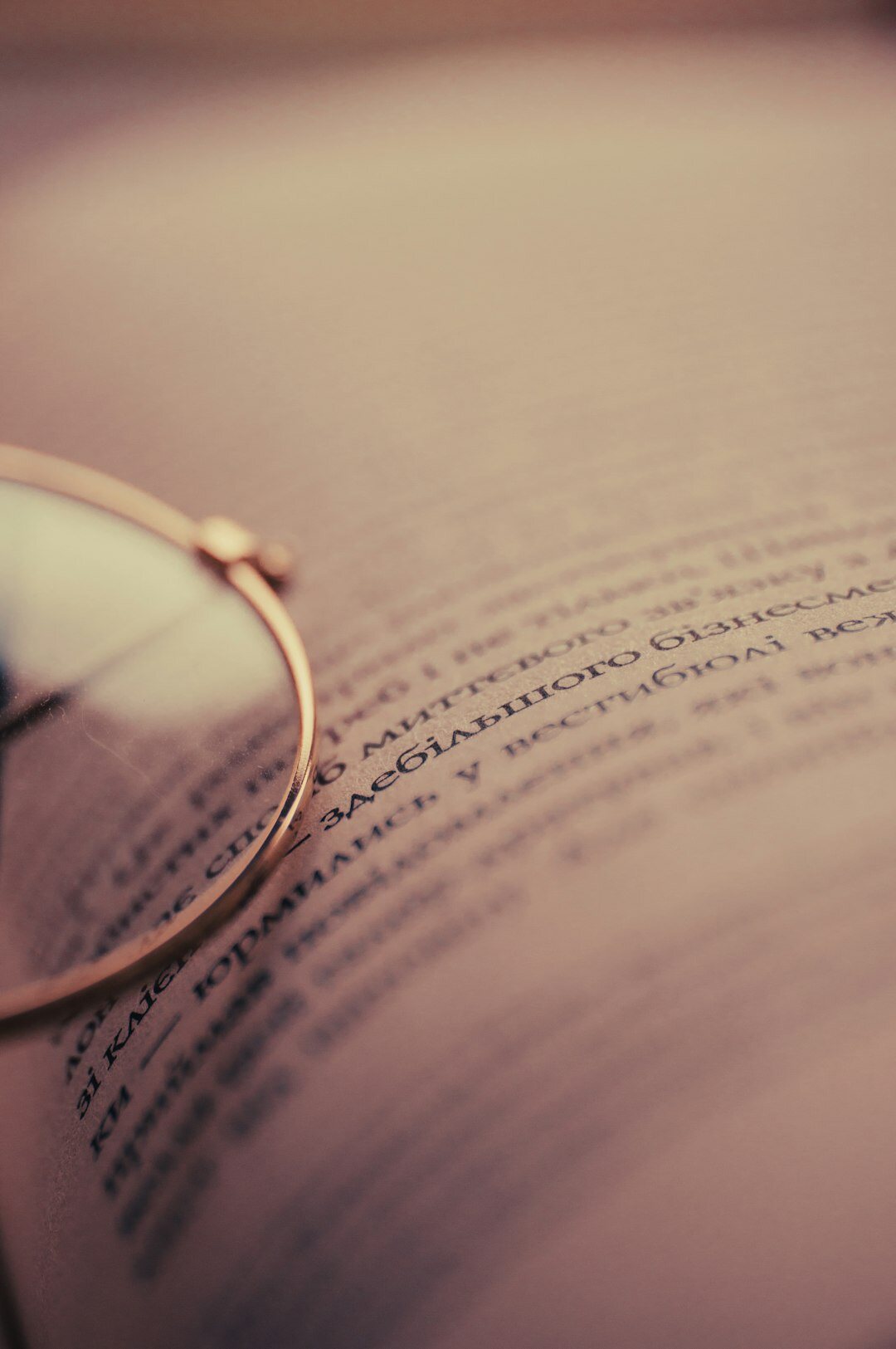 old book with magnifying glass